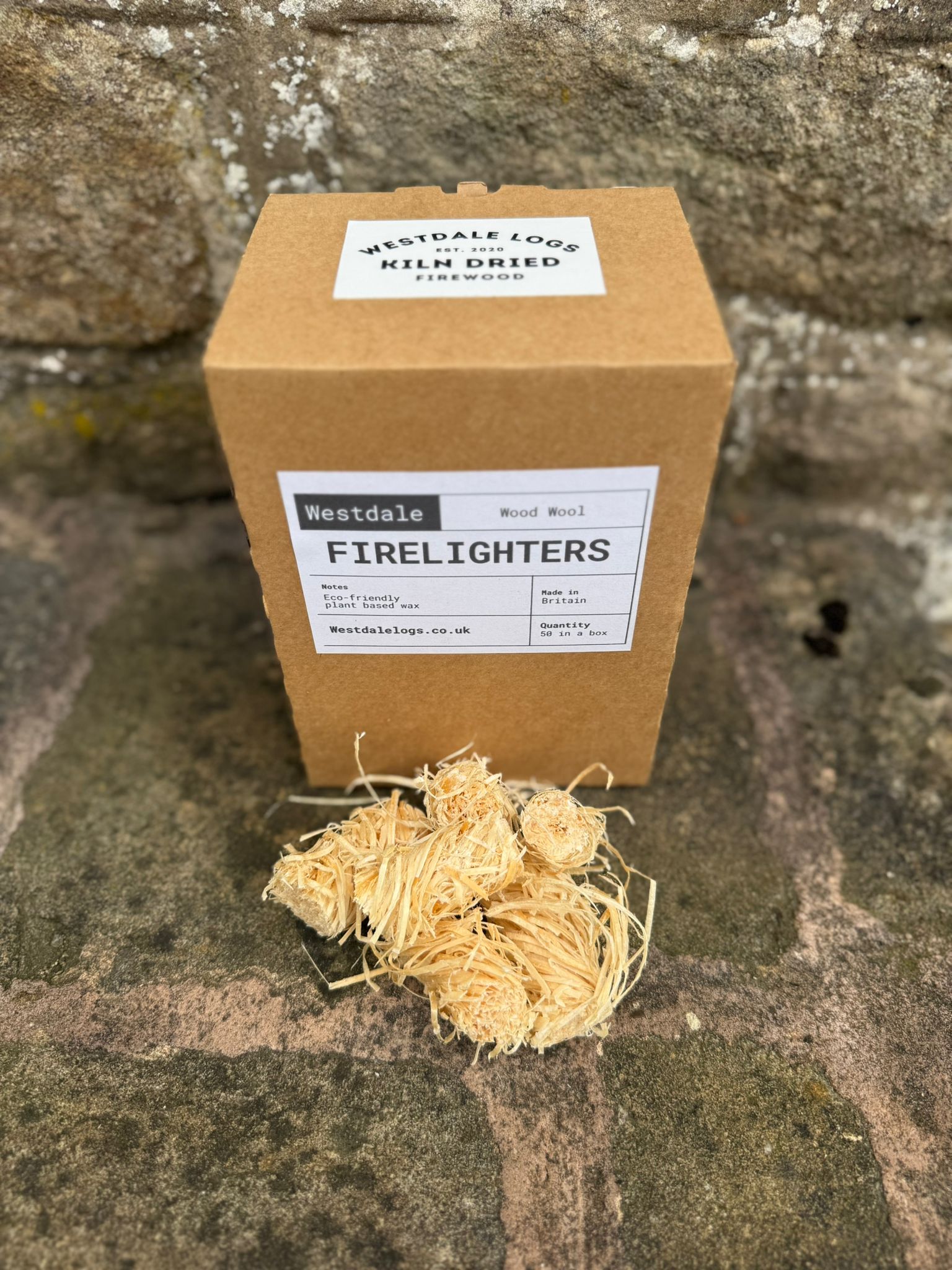 Box of Westdale Firelighters on a stone surface
